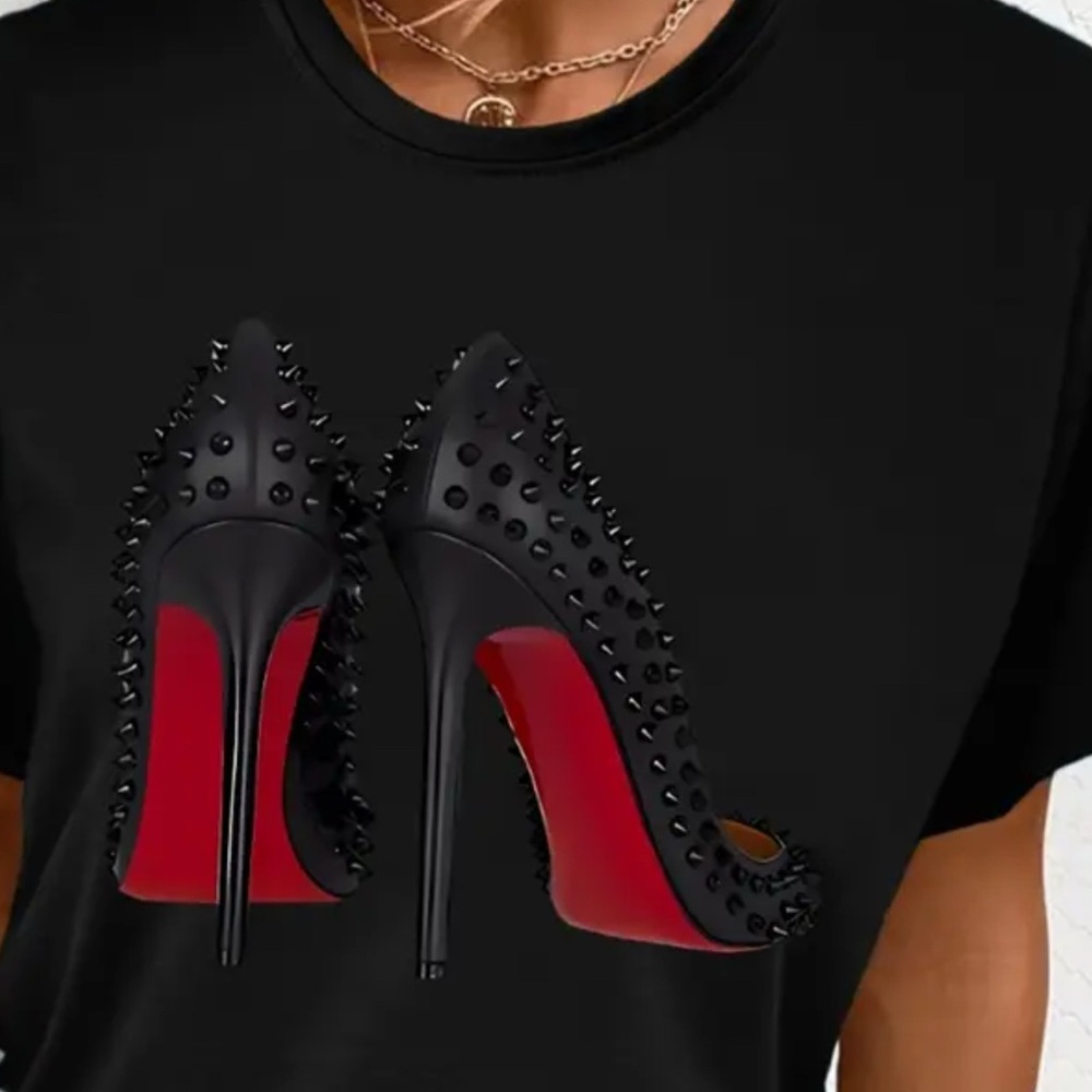 ❤️❤️SOLD❤️❤️Chic Black Graphic Tee with Studded Heels Design